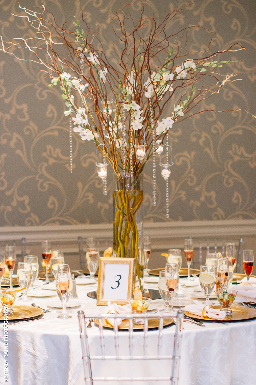 We love these rustic centerpieces the bride and groom brought in for their Emerald Ballroom wedding reception.
